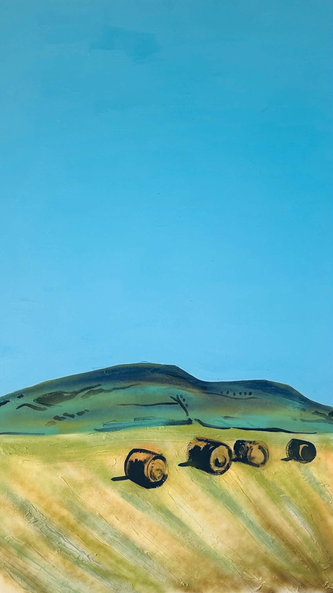 Liv’s painting of hay bales in a golden field